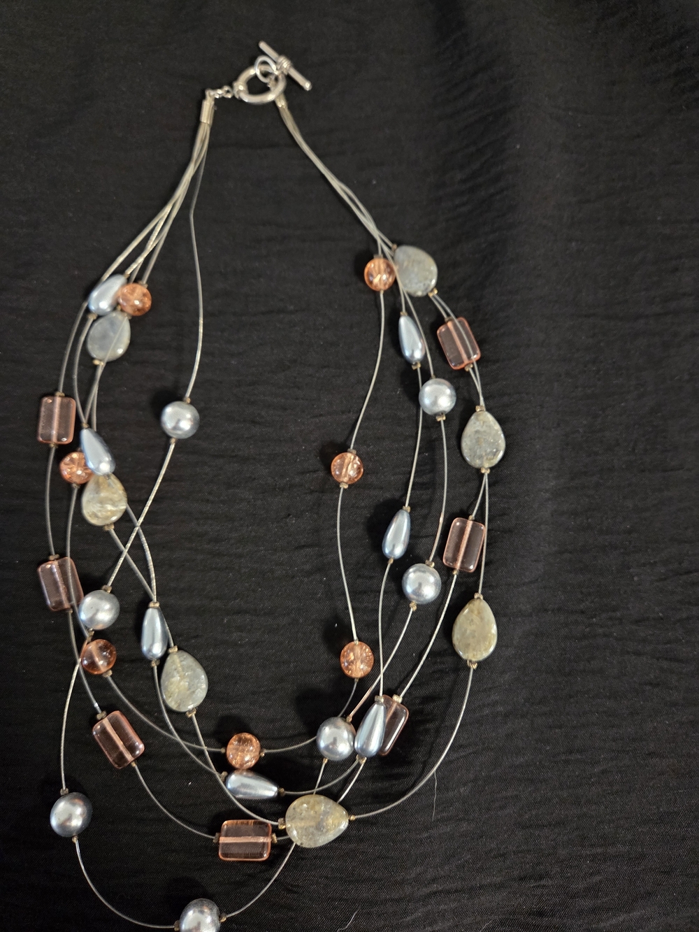 Multi-Strand Beaded Necklace in Gray, Amber, and Cream Tones